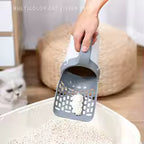 Kattengrind schep met zakken